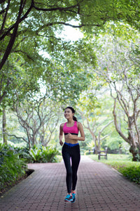 woman running with Noene Insoles 